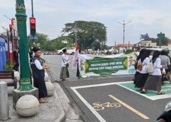 Aksi ASPI Yogyakarta menyerukan Indonesia Terang Benderang