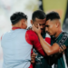 Para penggawa PSS Sleman saling berpelukan sebagai ekspresi kegembiraan usai memenangi laga atas Persija Jakarta pada laga lanjutan Liga 1 2024/2025, Minggu (18/5/2025)
