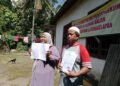 Evi Fatimah dan Suami memperlihatkan sertifikat kepemilikan tanah yang terkini masih jadi masalah terkait ulah mafia tanah di Sleman