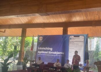 Ketua DPRD Sleman Gustan Ganda memberi sambutan dalam kegiatan peluncuran aplikasi tata kelola kunjungan tamu yakni SIMAKJAMU, Rabu (27/8/2025)