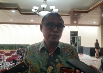 Kepala Dinas Komunikasi, Informatika dan Persandian (Diskominfo San) Kota Yogyakarta, Ignatius Trihastono saat ditemui di gedung Magister Manajemen (MM) Fakultas Ekonomika dan Bisnis (FEB) Universitas Gadjah Mada (UGM), Sleman, Kamis (18/9/2025).