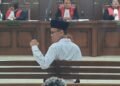 terdakwa pembakaran tenda Mapolda DIY Perdama Arie Veriasa saat mengikuti persodangan di Pengadilan Negeri Sleman, Rabu (18/6/2026). [populi.id/Hadid Pangestu]