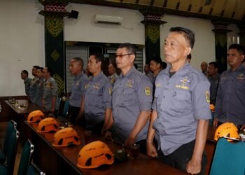 Anggota Satlinmas Kota Yogyakarta saat menghadiri kegiatan Laporan Kinerja Satlinmas pada Rabu (4/2/2026) di Ruang Bima, Balai Kota Yogyakarta.