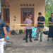 Anggota Polres Bantul menggelar olah TKP di kediaman seorang pria yang tewas dibacok saat tidur di Dusun Kaliurang, Argomulyo, Bantul, Rabu (25/2/2026).