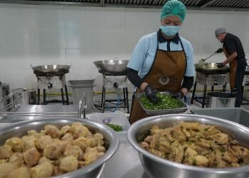Ilustrasi pengelolaan program Makan Bergizi Gratis (MBG).
