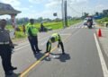 Polisi melakukan olah tempat kejadian perkara di lokasi kecelakaan di Jalan Pakem-Kalasan, Padukuhan Tegalrejo, Umbulmartani, Kalasan, Sleman, Selasa (9/6/2026).
