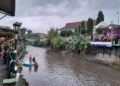 Pertunjukan seni budaya di bantaran Sungai Winongo dalam acara Winongo Art Festival pada Sabtu (13/6/2026).
