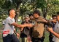 Tangkapan layar saat Danrem 072/Pamungkas, Brigjen TNI Yuniar Dwi Hantono, terlibat cek-cok dengan marshal event Mandiri Jogja Maraton karena ajudannya ditarik ke luar lintasan, Minggu (21/6/2026).
