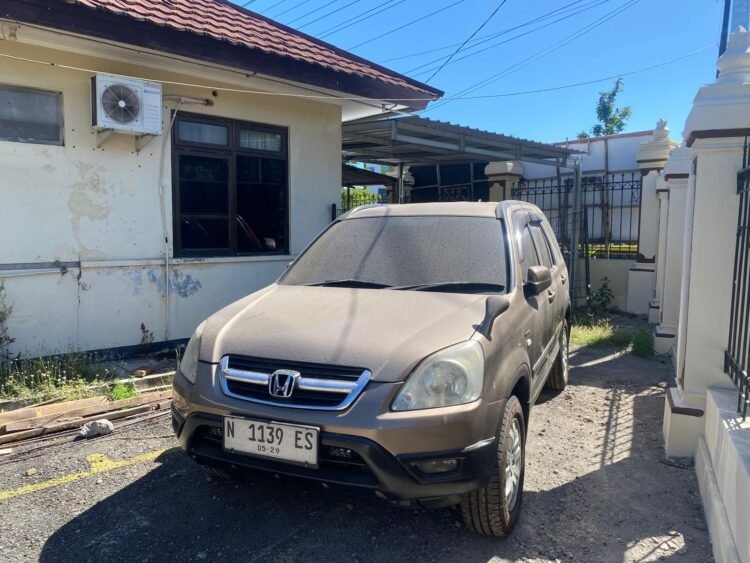 Barang bukti berupa mobil hasil penggelapan dan penipuan oleh seseorang berinisial N (48).