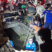 Petugas Damkarmat Kota Yogyakarta mengevakuasi seekor kuda penarik andong yang tercebur ke dalam selokan di Jalan Pramuka, Kemantren Umbulharjo, Kota Yogyakarta, pada Minggu (28/6/2026) tengah malam.