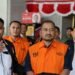 Bupati Pemalang, Anom Widiyantoro, berjalan menuju mobil tahanan dari Gedung Merah Putih KPK di Jakarta, Kamis (30/7/2026).